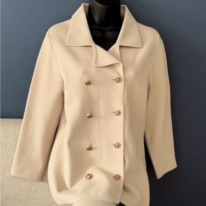 Double breasted knit blazer.